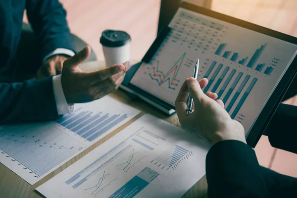 depositphotos 308613912 stock photo two business partnership coworkers analysis 1